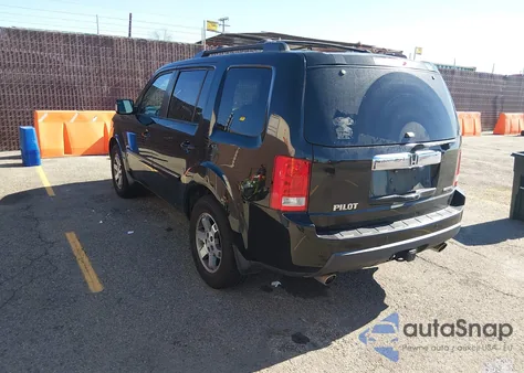 2010 Honda Pilot Touring из США, поврежденный, VIN 5FNYF3H94AB013651